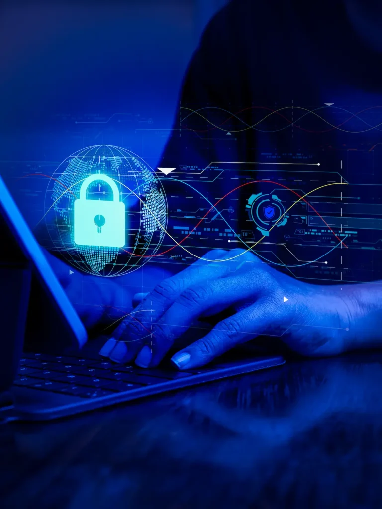 cybersecurity expert working on laptop